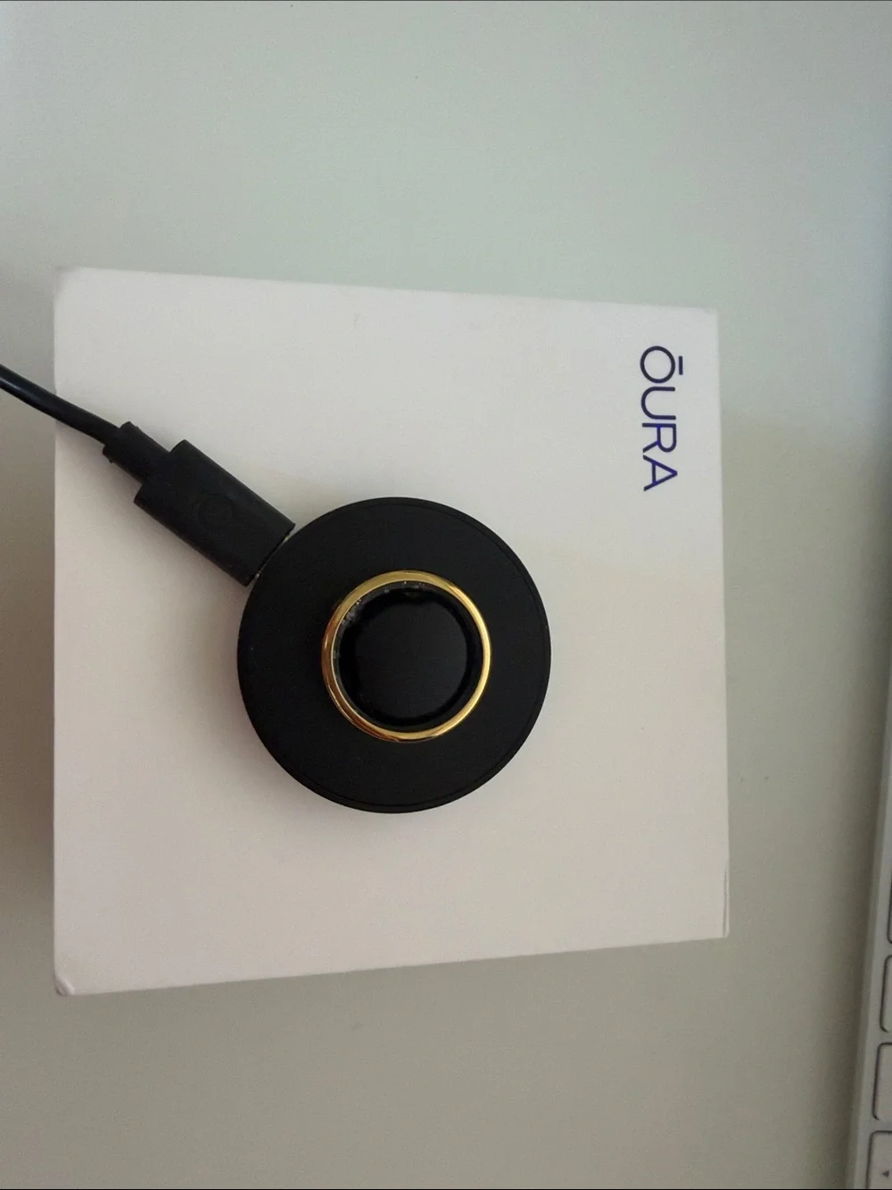 Oura Gen 3 Ring Gold with charger